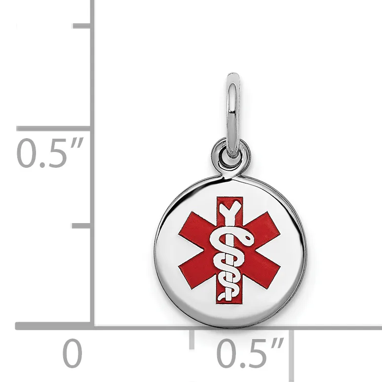 A sterling silver medical alert pendant with a red and white enameled caduceus symbol, shown next to a measurement scale indicating approximately half an inch in diameter.