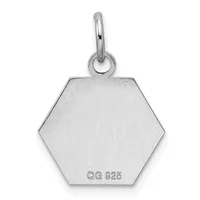 A sterling silver hexagonal pendant with a brushed finish and a small stamped hallmark on the lower face, suspended from a polished bail loop.