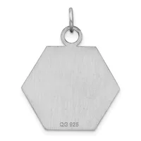 A sterling silver hexagonal pendant with a brushed finish and a small stamped hallmark on the lower face, suspended from a looped bail at the top.