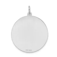 A polished sterling silver circular pendant with a small loop attachment at the top and a hallmark stamped on the lower back.