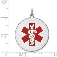 Round silver medical alert pendant with red star of life symbol and white caduceus, shown next to ruler measuring approximately one inch in diameter.