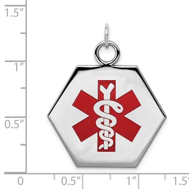 Hexagonal medical alert pendant with red Star of Life symbol and caduceus on white background, shown next to measurement scale indicating approximately one inch width.