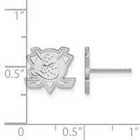Silver hockey-themed stud earrings with a palette and brush design, shown front and side view with measurement scale indicating approximately 0.5 inch width.