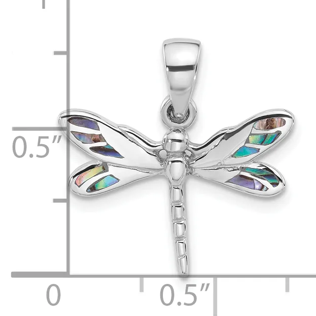 Silver dragonfly pendant with abalone shell inlaid wings displayed against a measurement scale showing approximately half an inch in size.
