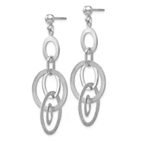 A pair of silver dangle earrings with interlocking oval and circular links suspended from ball studs.