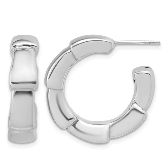 A pair of polished silver chunky hoop earrings with segmented curved bands, shown from front and side views.