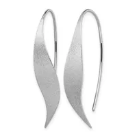 A pair of silver elongated leaf-shaped earrings with a textured finish and thin wire hooks for hanging.