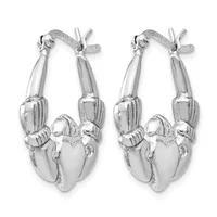 A pair of polished silver hoop earrings with an ornate design featuring ribbed cylindrical sections and a heart-shaped pendant, shown from the front against a white background.