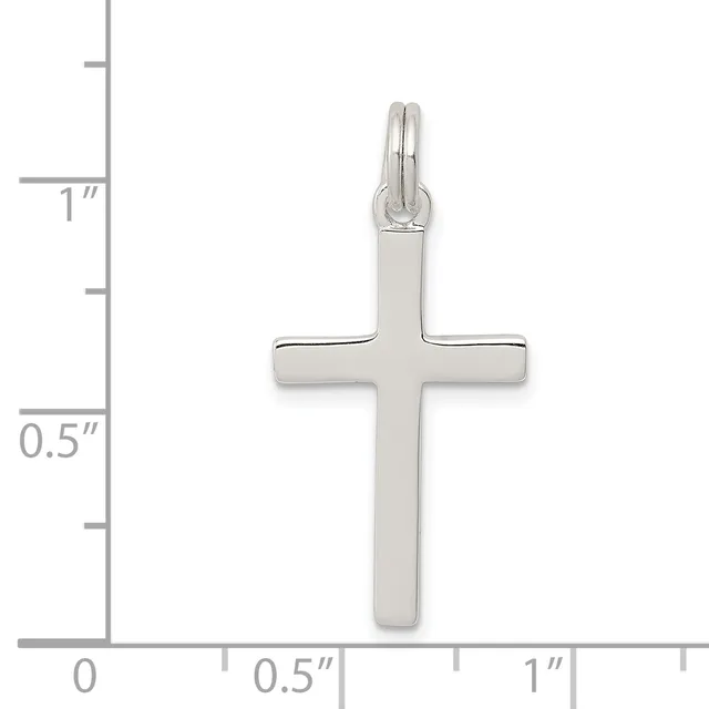 Sterling silver cross pendant shown against a ruler measuring approximately one inch tall and half an inch wide.