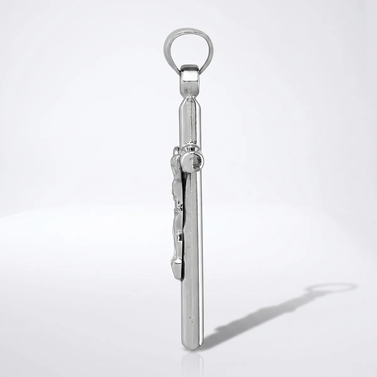 A silver metal corkscrew with a ring handle at the top and folding arms attached to the shaft, displayed vertically against a white background.