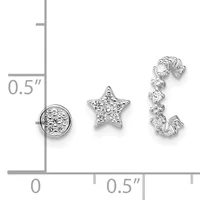 Three silver jewelry pieces with cubic zirconia stones displayed on a measurement grid: a circular pendant, a star-shaped pendant, and an open-work curved earring.
