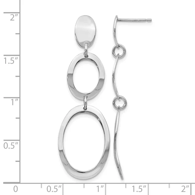 A pair of silver-toned dangle earrings with post backs, featuring two graduated oval rings stacked vertically on each earring, displayed against a measurement scale.