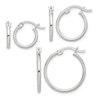 Three pairs of silver-toned hoop earrings in increasing sizes, displayed with matching posts and hinged closures.