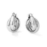 A pair of polished silver-toned hoop earrings with ridged outer surfaces and smooth inner curves, displayed against a white background.