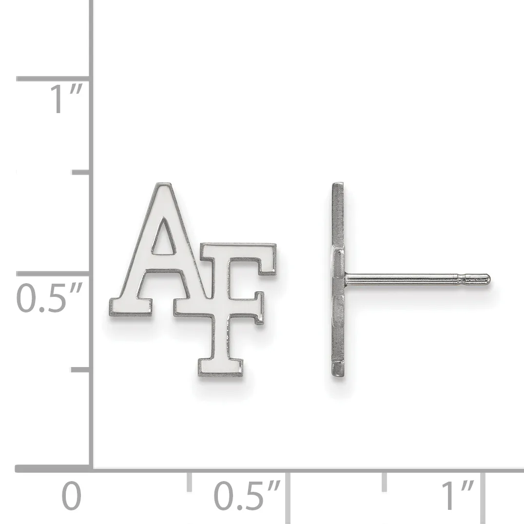 Silver stud earrings with interlocking letters and a cross design, shown front and back view with a measurement scale indicating approximately 0.5 inches in height.
