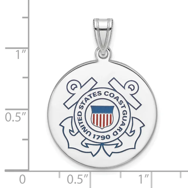 Silver pendant featuring a circular disc with the United States Coast Guard emblem, including anchors, a shield with vertical stripes, and text around the border, shown next to a ruler for scale.