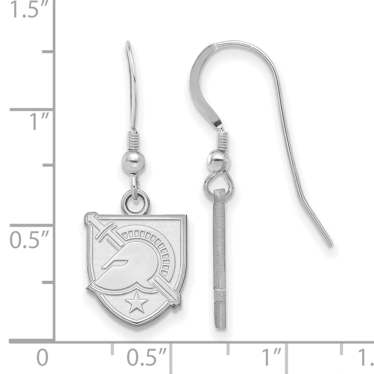 A pair of silver-toned dangle earrings with shield-shaped pendants featuring engraved designs, displayed against a measurement scale showing approximately one inch in length.