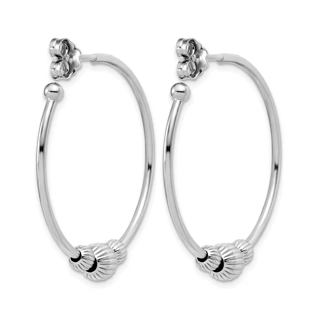 Pair of silver-toned hoop earrings with textured shell-shaped motifs at the bottom and ball stud posts at the top.