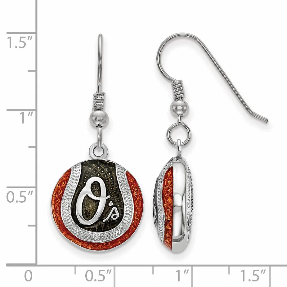 Pair of dangle earrings featuring red enamel circular discs with silver-tone metal accents and ornamental details, displayed against a measurement scale.