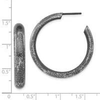 Two textured silver hoop earrings shown against a measurement scale, one pair displayed front-facing and one shown from the side, approximately 1.5 inches in diameter.