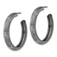 A pair of textured hoop earrings with glittery silver finish and dark inner bands, displayed against a white background.