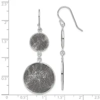A pair of silver dangle earrings with two textured circular discs connected by a chain, displayed against a ruler showing approximately 2.5 inches in length.