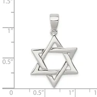 A polished sterling silver Star of David pendant with overlapping triangles shown next to a ruler for scale, measuring approximately one inch in width.