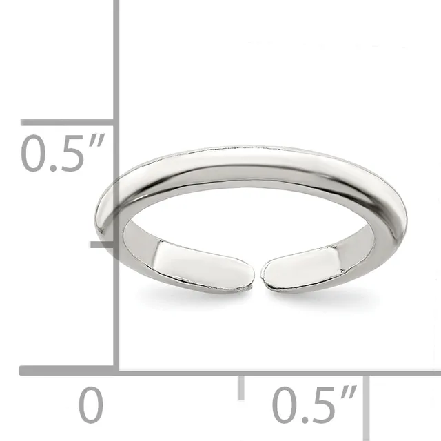 A polished silver open cuff ring shown next to a measurement scale indicating its width is approximately 0.5 inches.