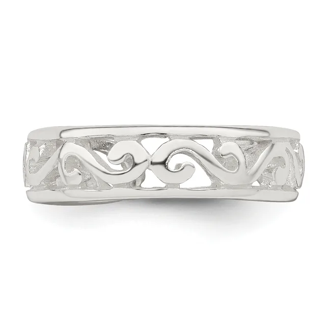 Silver ring with an ornate openwork band featuring scrolling curved designs, photographed from above against a white background.
