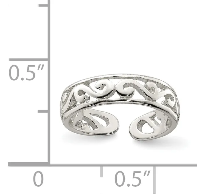 Sterling silver open toe ring with a scrolled and pierced decorative band, shown next to a measurement scale indicating approximately half an inch in width.