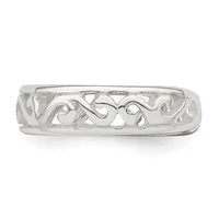 Silver hair barrette with an open filigree design featuring scrolling curved motifs along the length, shown against a white background.