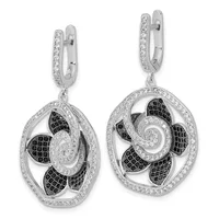Pair of silver drop earrings with hinged oval tops decorated with small diamonds, suspending larger oval pendants featuring black and white diamonds arranged in a swirling pinwheel pattern.