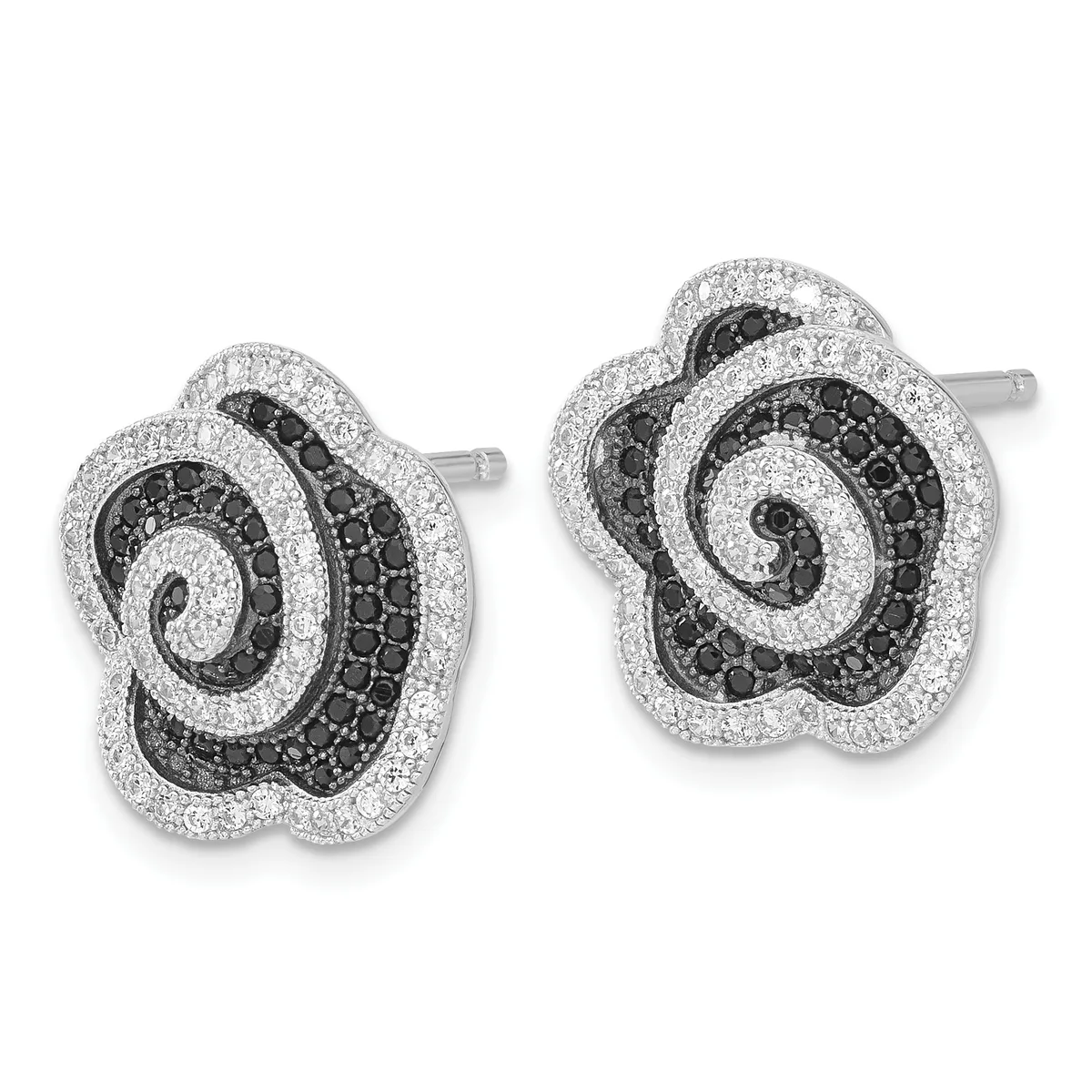 A pair of silver stud earrings featuring swirling floral designs with black and white diamonds arranged in concentric spiral patterns.