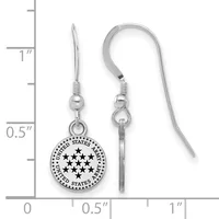 Pair of silver-toned dangle earrings with a circular charm stamped with stars and text, shown next to a ruler for scale.