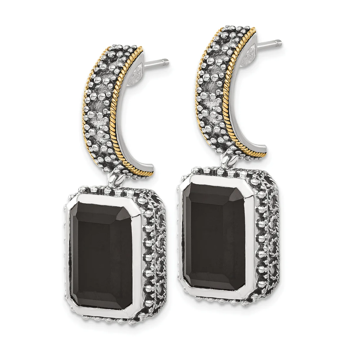 Pair of two-tone drop earrings with curved gold-trimmed tops studded with small stones and rectangular black onyx pendants surrounded by beaded silver settings.