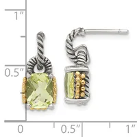 Pair of silver and gold drop earrings with twisted rope details and rectangular faceted pale yellow-green gemstones, shown against a measurement scale.