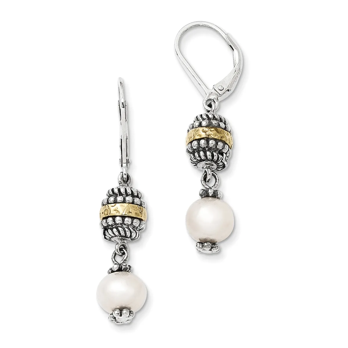 Pair of silver dangle earrings with ornate beaded caps in two-tone silver and gold, each suspending a white pearl, shown on white background.
