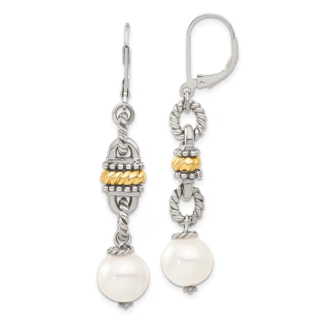 A pair of silver dangle earrings with twisted rope detailing, gold-tone accents, and white pearl drops suspended from lever-back closures.