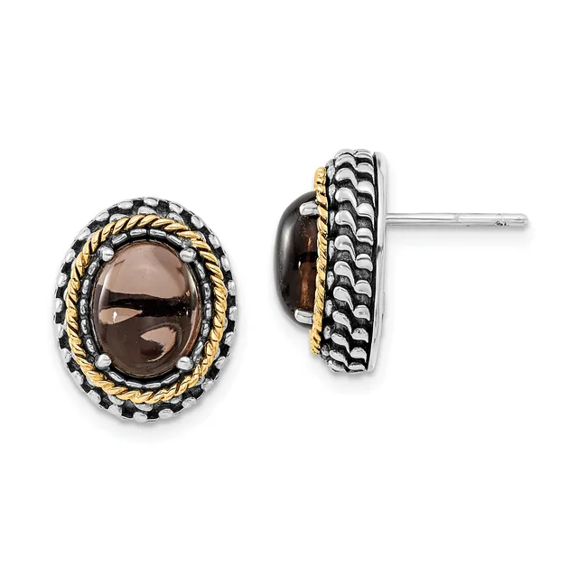 A pair of oval smoky quartz stud earrings with twisted gold-tone and textured silver-tone borders, shown from front and back views.