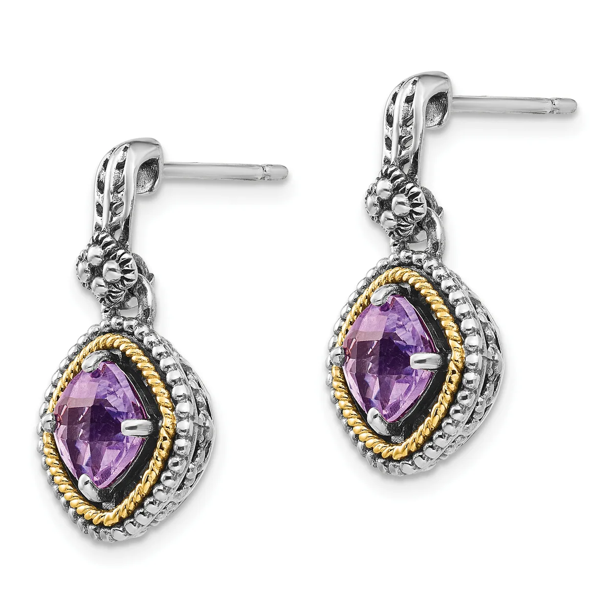 Pair of silver drop earrings with gold-tone twisted bezels surrounding oval amethyst stones, featuring decorative lion head details at the top and textured silver posts.