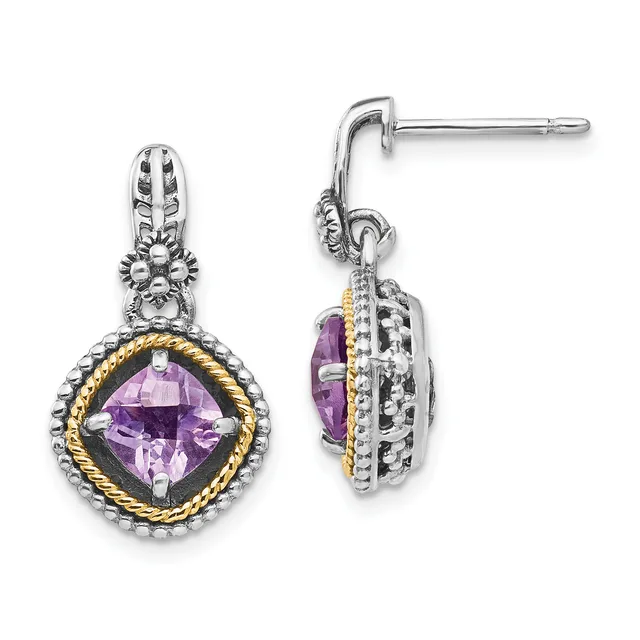 Pair of silver and gold-tone dangle earrings with cushion-cut purple gemstones surrounded by decorative beaded and twisted rope detailing.
