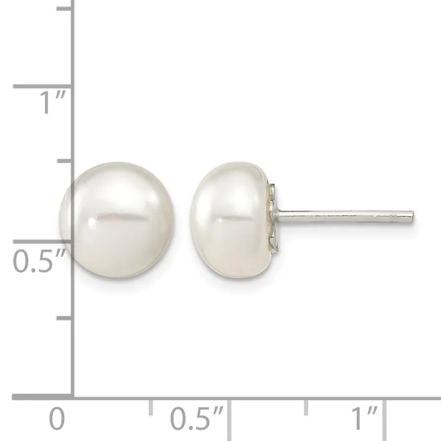 A pair of white pearl stud earrings with sterling silver posts and backs, displayed against a ruler showing the earrings are approximately half an inch in diameter.