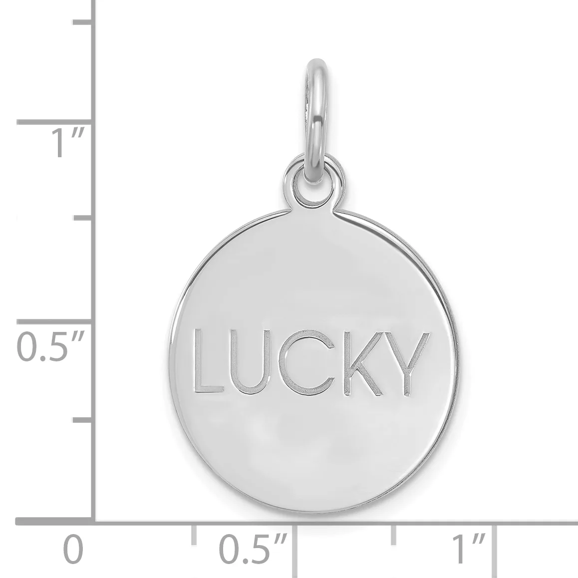 Silver-toned circular pendant with the word "LUCKY" engraved on its face, suspended from a bail loop, shown against a ruler scale.