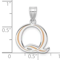 Two-tone silver and rose gold pendant shaped like the letter Q with a polished finish, shown next to a ruler indicating its size as approximately three-quarters of an inch tall.