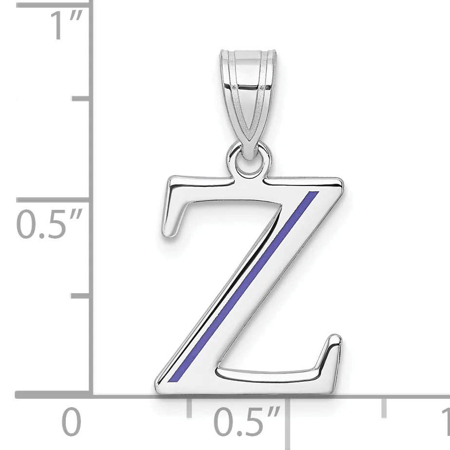 Silver pendant shaped like the letter Z with a blue diagonal stripe, shown next to a ruler indicating approximately one inch in height.