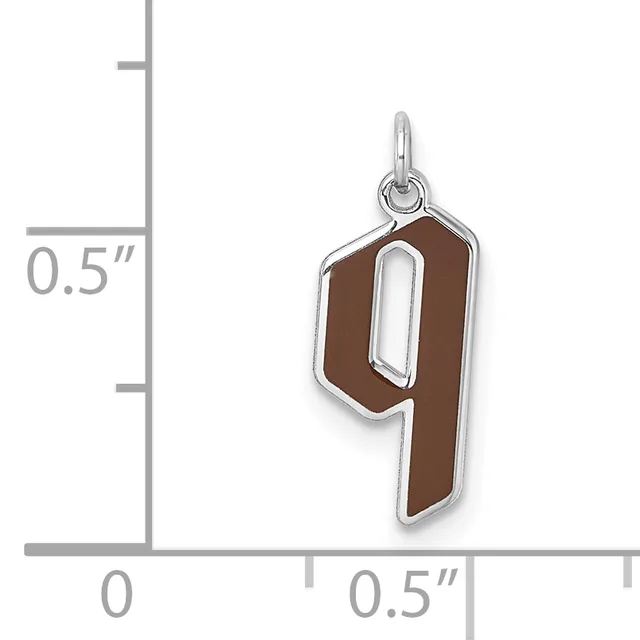 A silver charm with a brown enamel number 9 and white outline, shown next to a ruler indicating approximately 0.5 inches in height.
