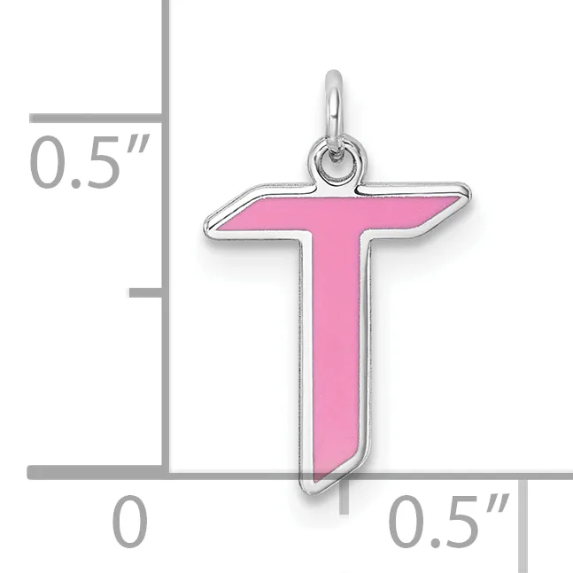 A pink enamel cross pendant with silver-tone metal outline and loop, shown next to a measurement ruler indicating approximately 0.5 inches in height.