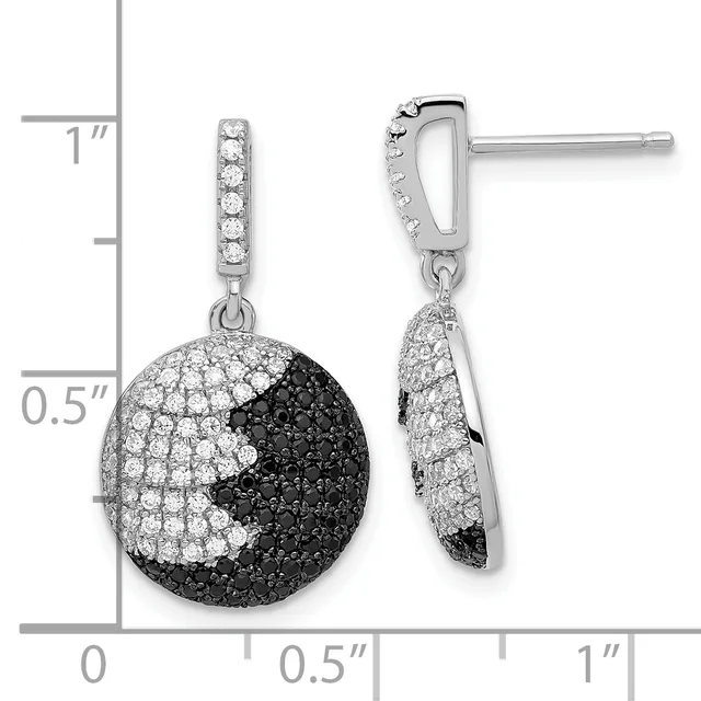 Pair of silver earrings featuring spherical pendants paved with black and white diamonds, suspended from diamond-set posts with measurement scale.