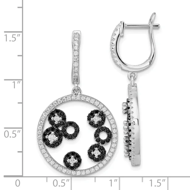 Sterling silver dangle earrings featuring a circular frame set with clear crystals surrounding five black and white clustered flower motifs, shown front and back with a measurement scale.