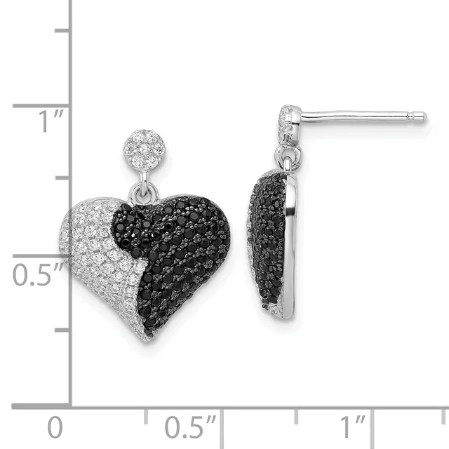 A pair of heart-shaped drop earrings with black and white crystal pave, displayed next to a measurement scale showing approximately one inch in length.